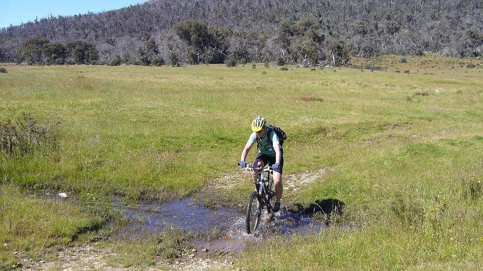 17-Heidi cycles across the Vic-NSW border creek.JPG